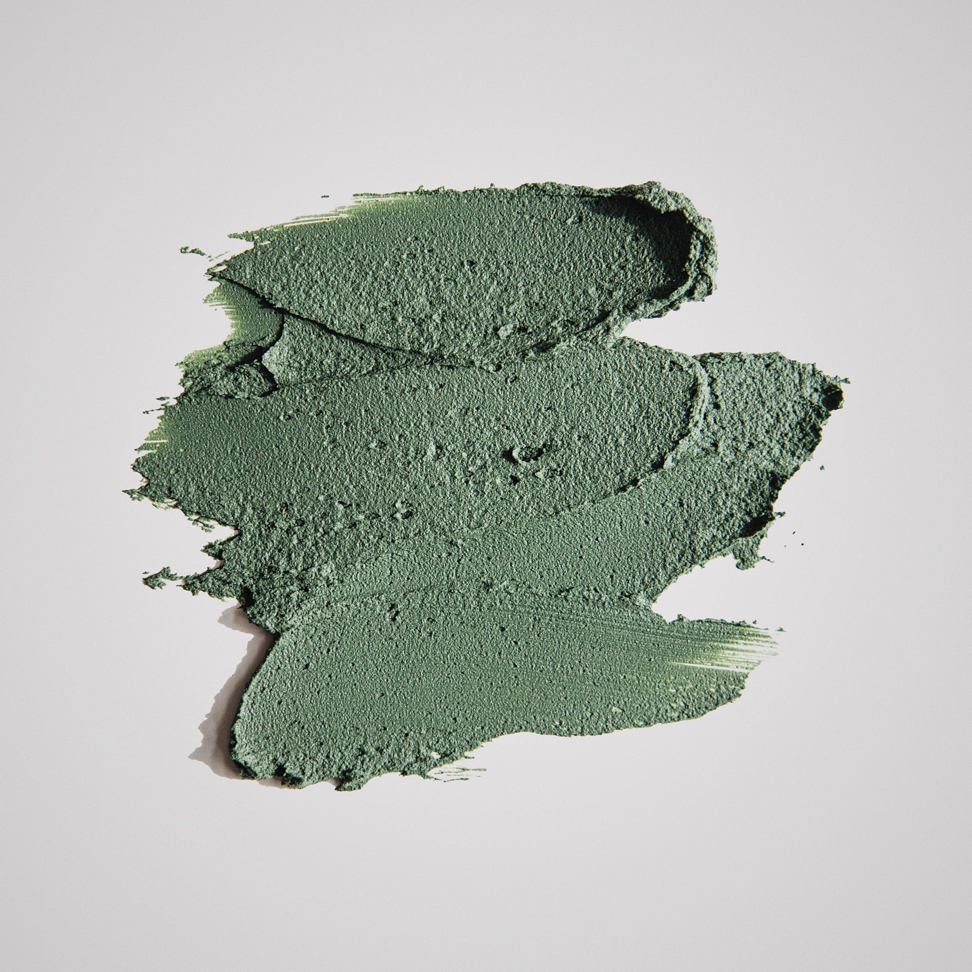 texture of green clay face mask