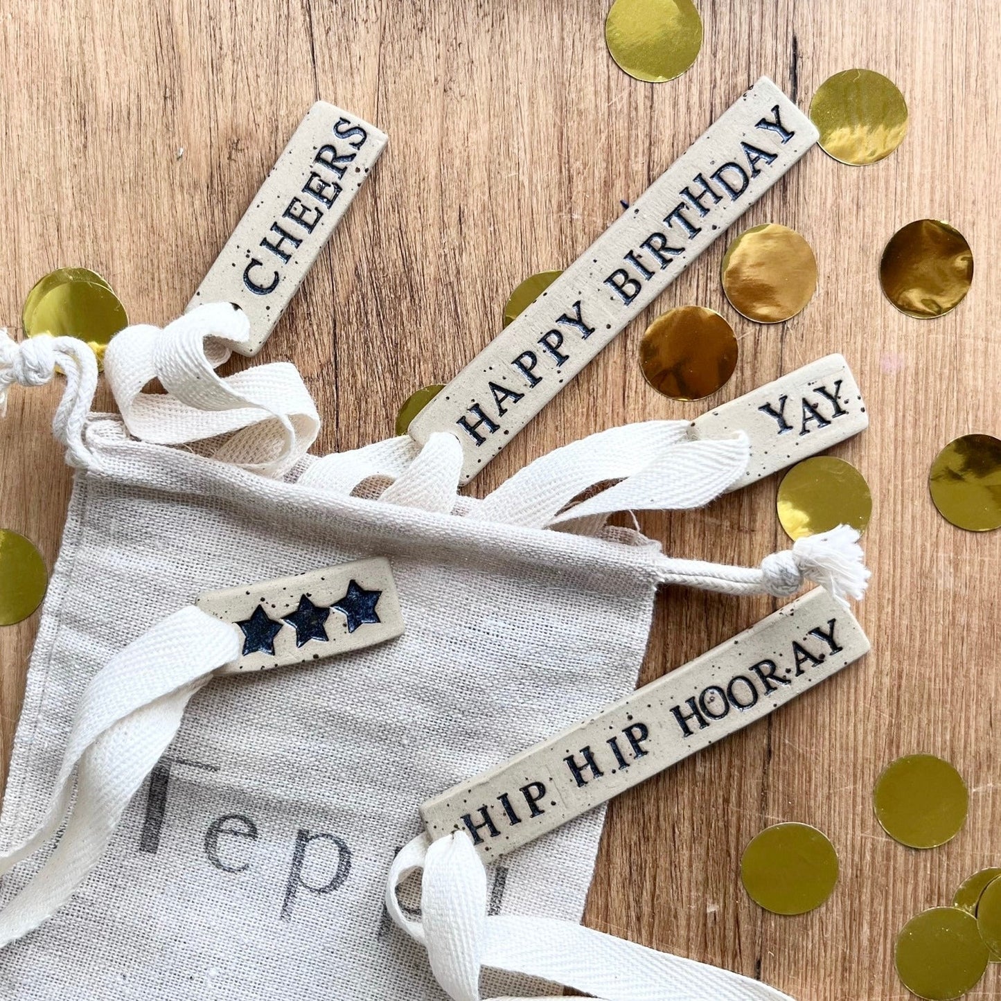 Celebration ceramic tag set + linen pouch