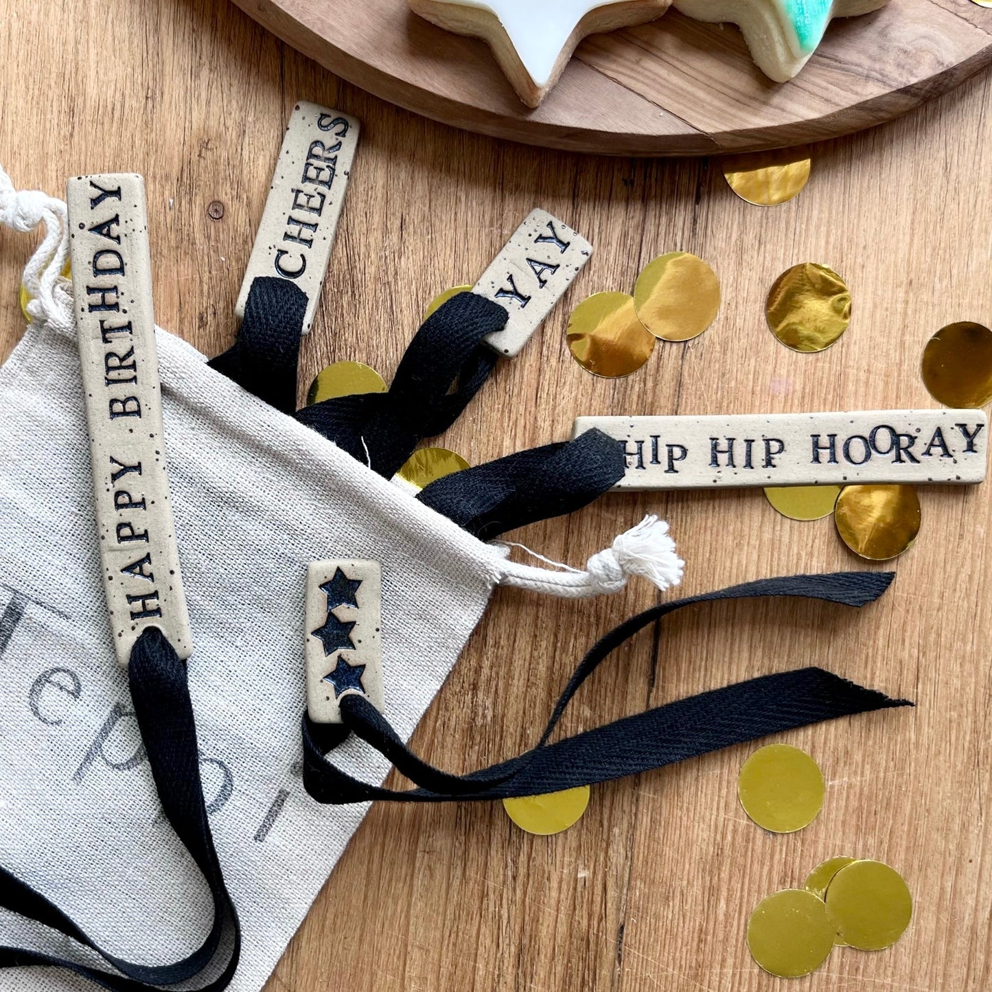 Celebration ceramic tag set + linen pouch